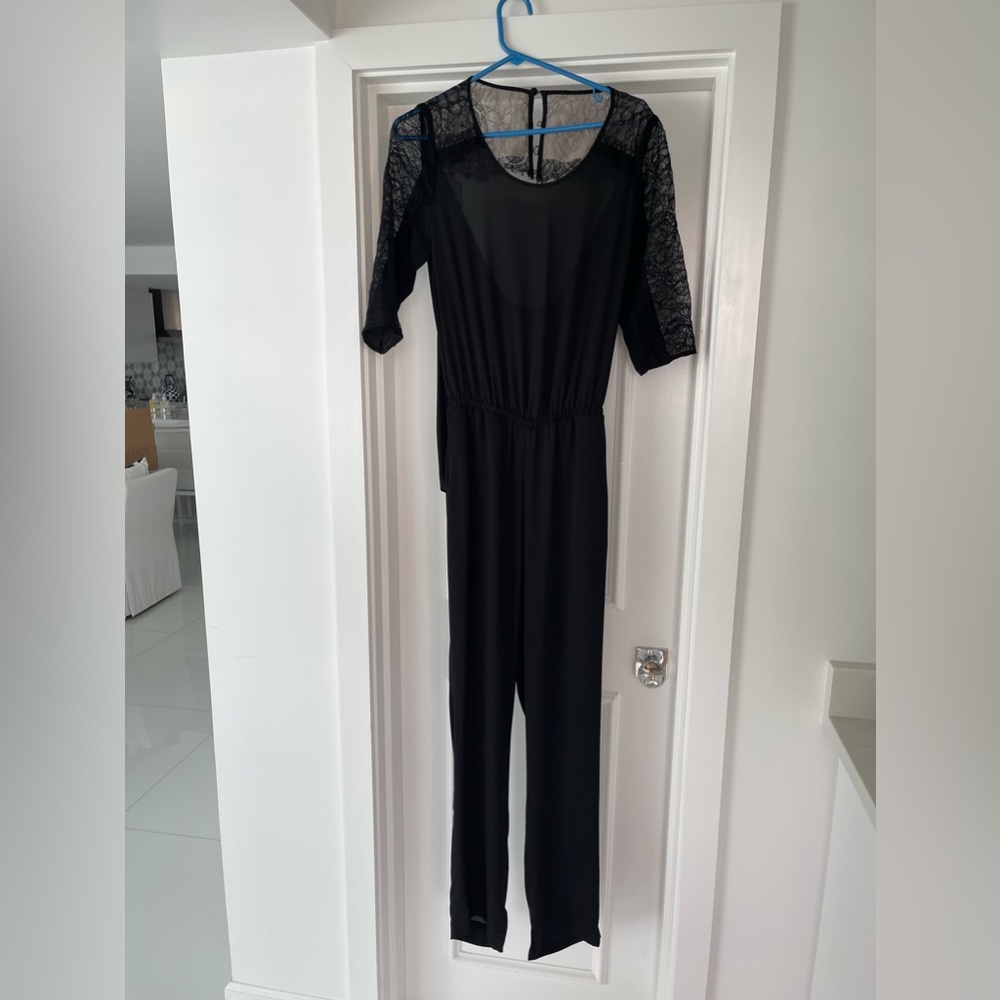 BCBG jumpsuit size S, black with lace.